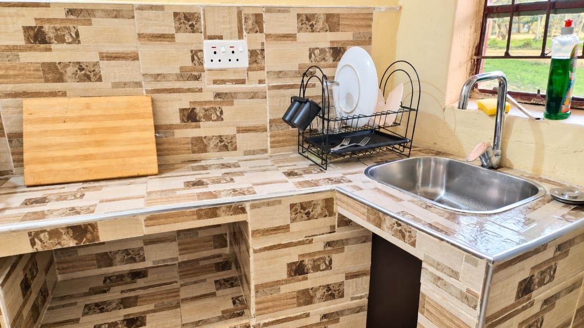 Family Chalet kitchen counter with sink and drying rack