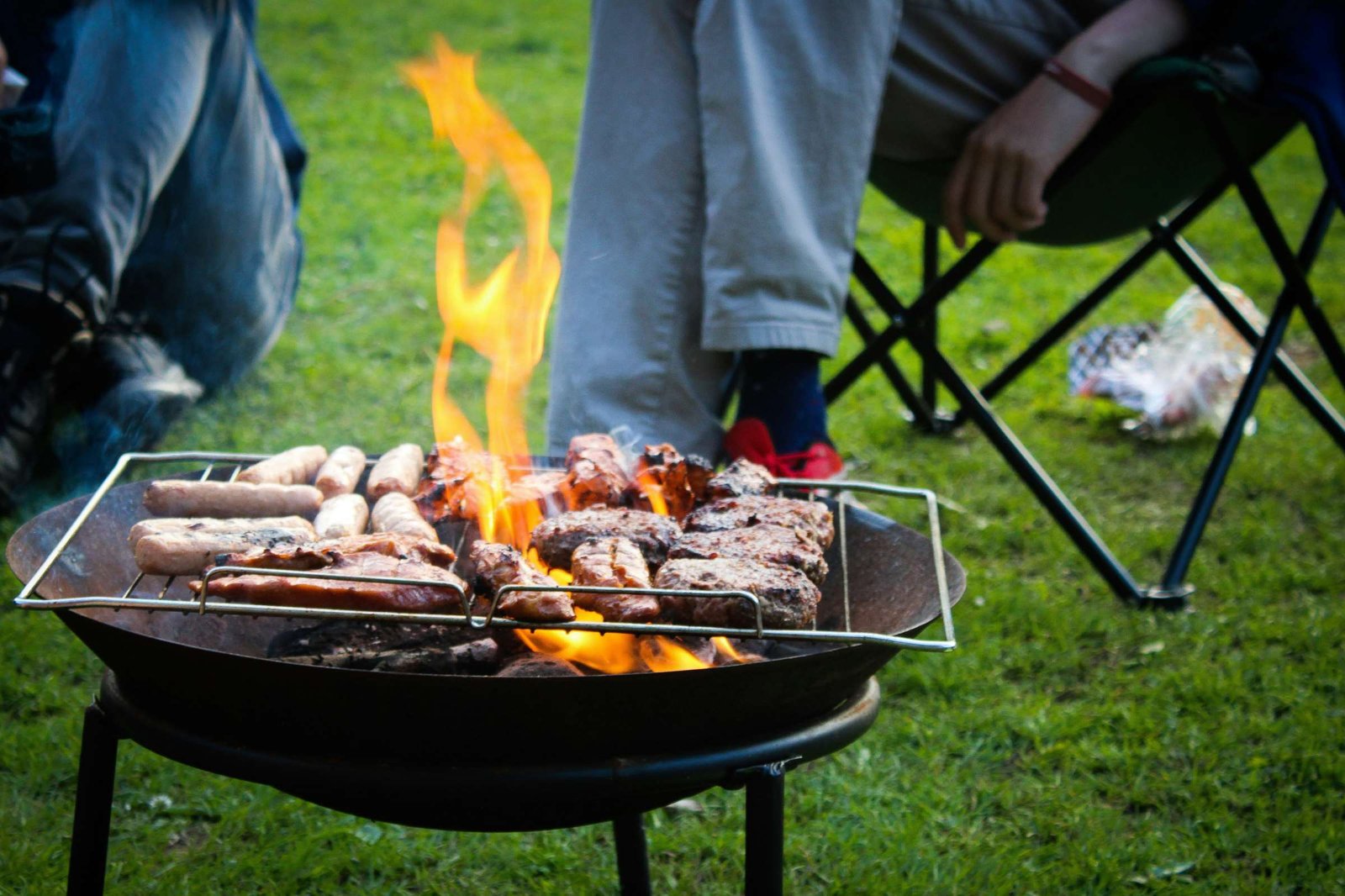 Sausages and chops on a braai grill