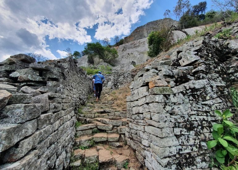 A visitor on the stone passage at Great Zimbabwe