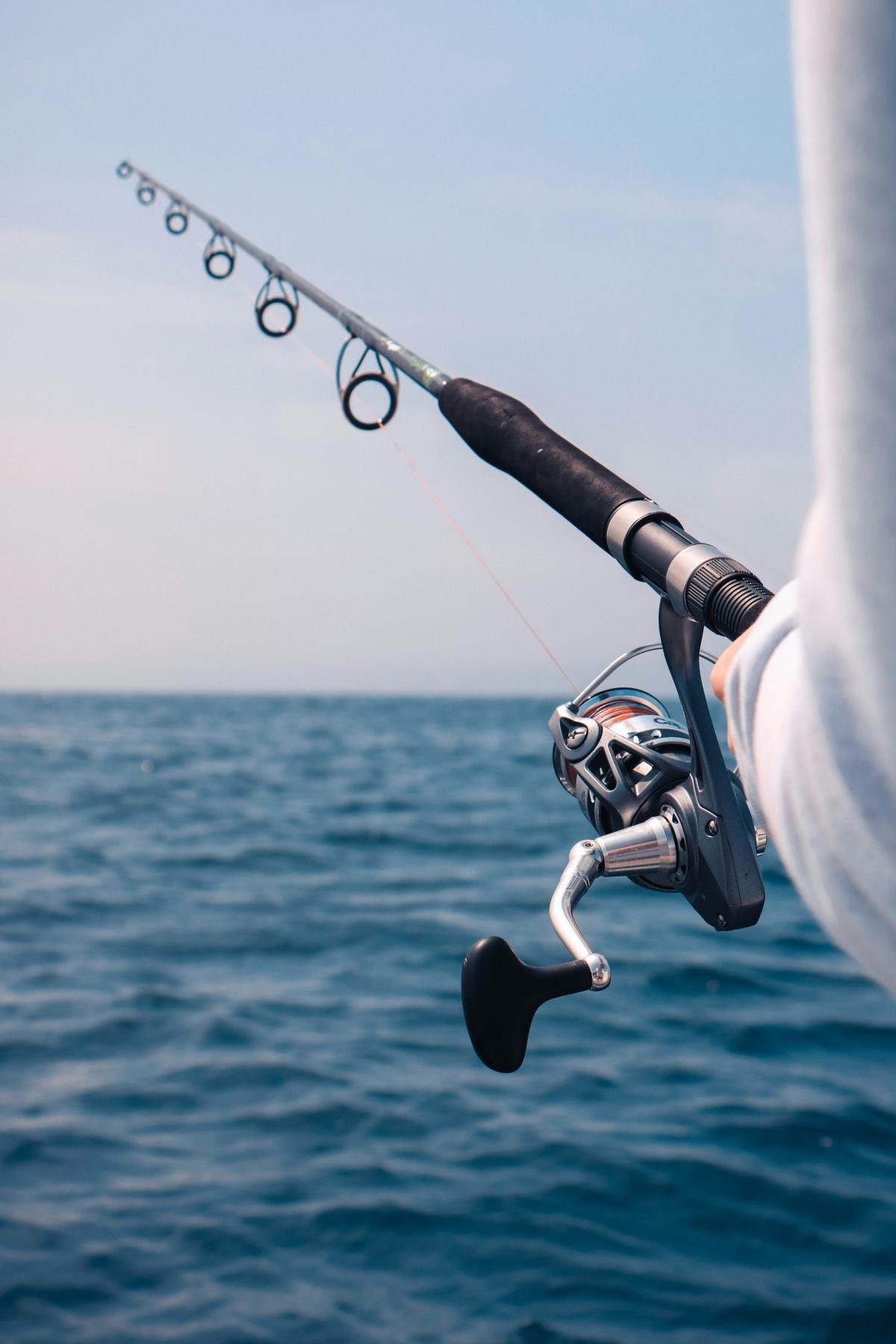 Fishing rod held out over the water